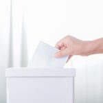 A person voting at the elections