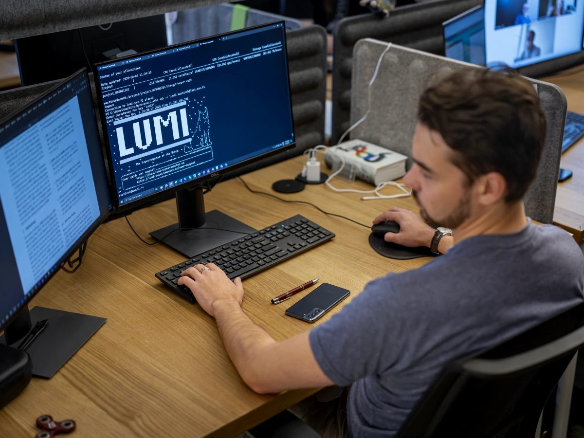 TildeOpen team member working with LUMI interface